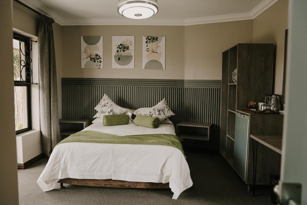Katil atau katil-katil dalam bilik di Stone Olive Guesthouse
