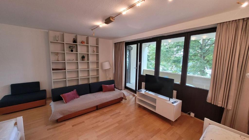 Χώρος καθιστικού στο Bright & Cozy Apartment in Mainaschaff