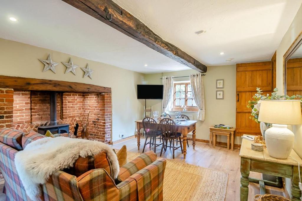 Televiisor ja/või meelelahutuskeskus majutusasutuses Fox Cottage