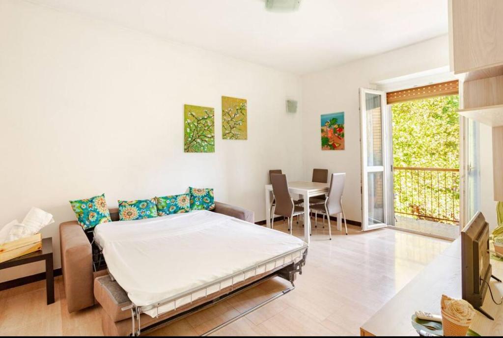 a hospital room with a bed and a table at Youhome Millelire Apartment in Milan