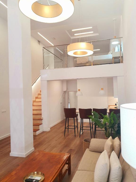 a living room with a couch and a table at Espacio 21 in Córdoba