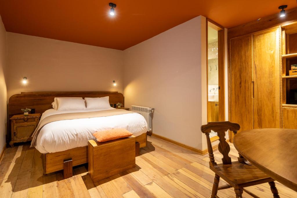 Postel nebo postele na pokoji v ubytování Hotel 1821