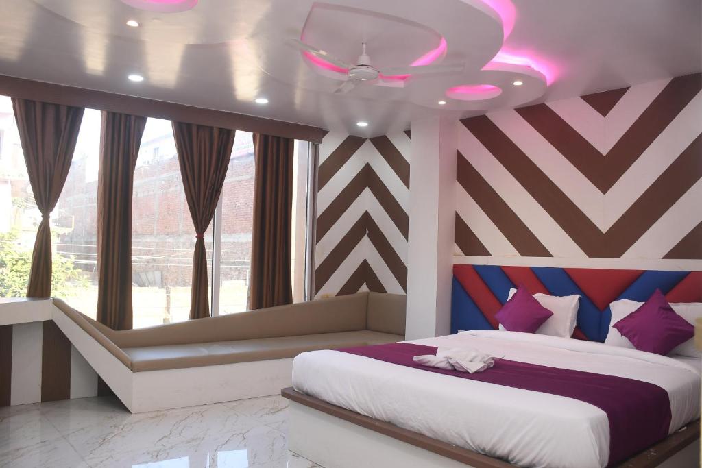 Postel nebo postele na pokoji v ubytování Hotel central point