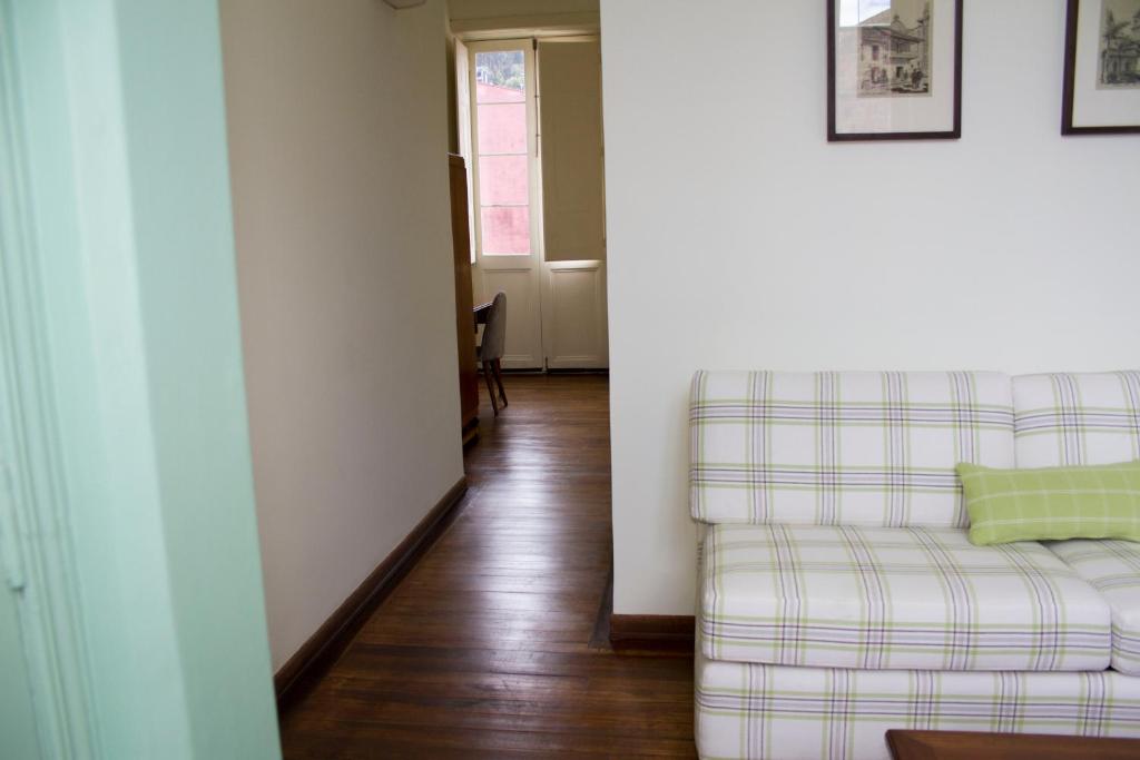 Postel nebo postele na pokoji v ubytování Hotel Casa de la Vega