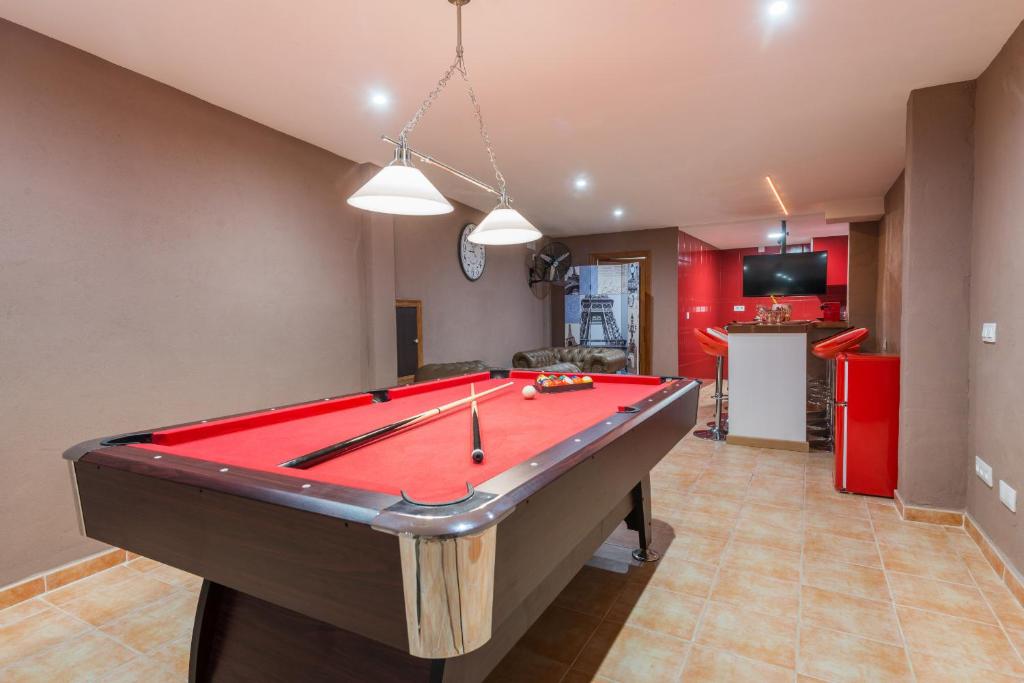 a living room with a pool table in it at Sunset Casa Rosi in Alcudia