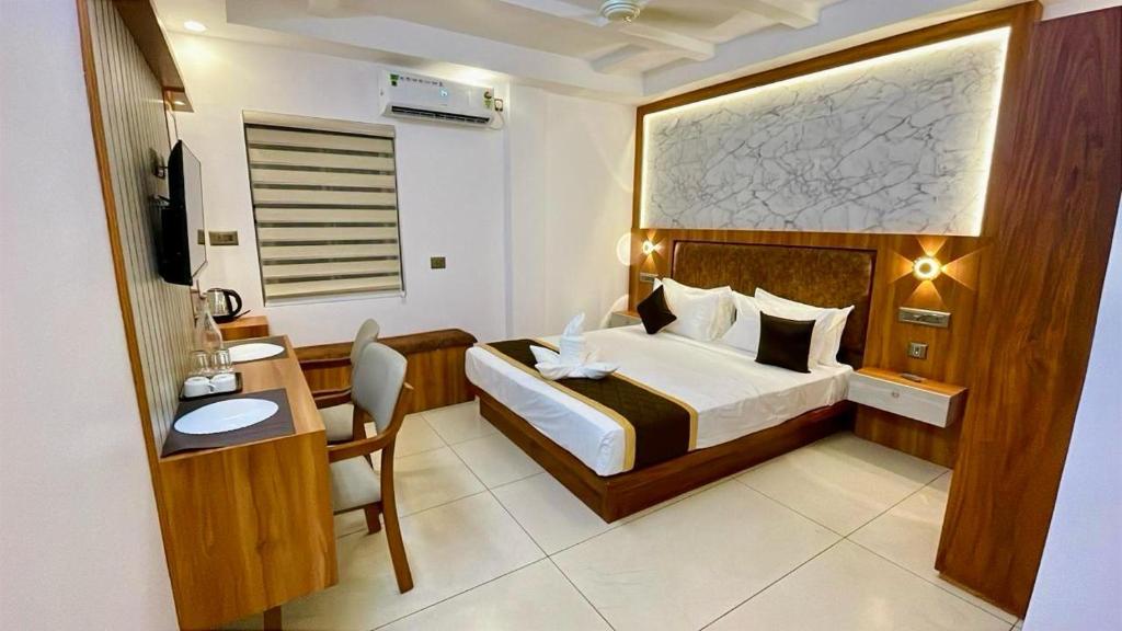 Postel nebo postele na pokoji v ubytování Skyluxe Airport Hotel