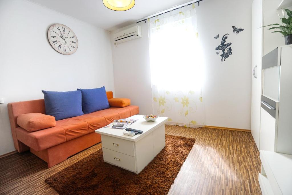 Posezení v ubytování Floral Apartment