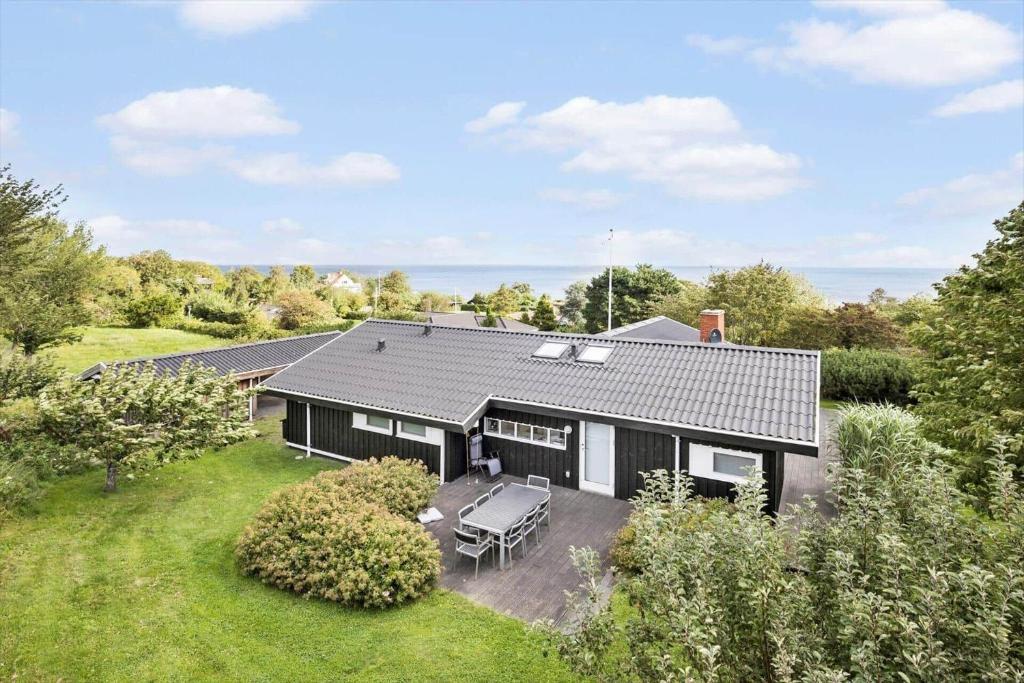 an aerial view of a house with a yard at 6803-Allinge-Asbakken-20 in Allinge