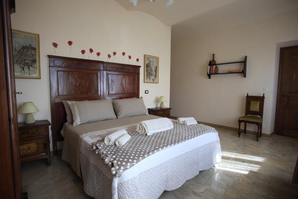 Postel nebo postele na pokoji v ubytování Al Canei B&B