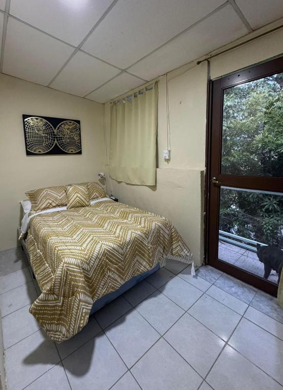 A bed or beds in a room at Copinol 68
