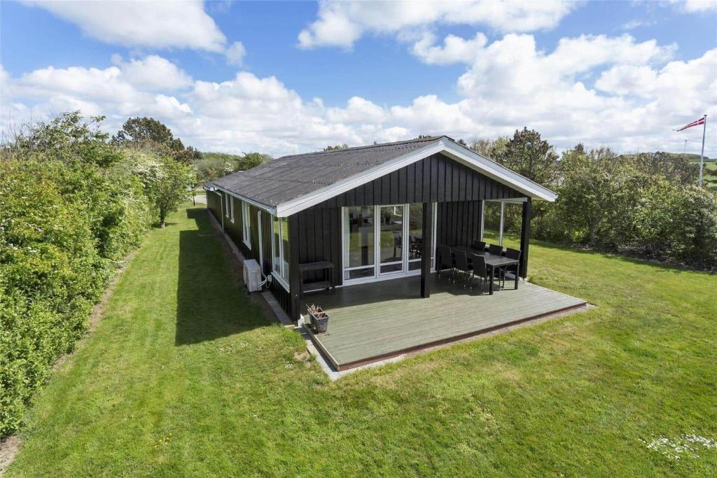 an overhead view of a small house on a lawn at LF593-Vestervig-Ingeborgs-Alle-21 in Vestervig