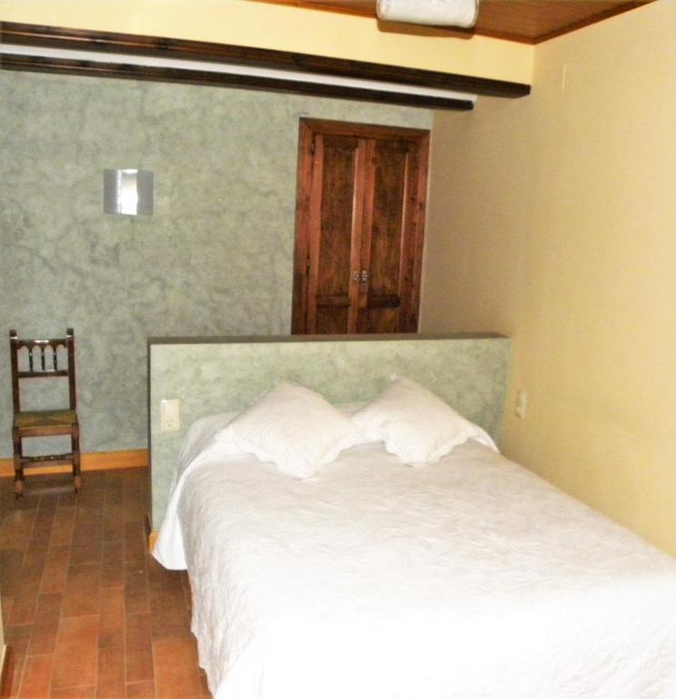 Postel nebo postele na pokoji v ubytování Casa Jabonero