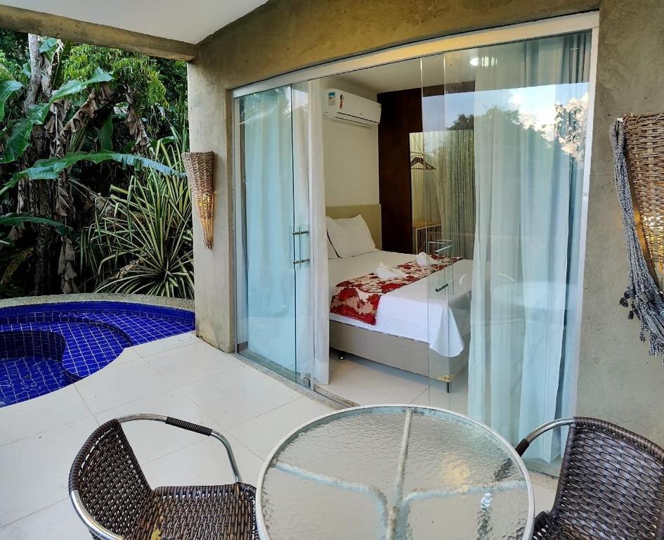 Postel nebo postele na pokoji v ubytování Suite com jacuzzi privativa