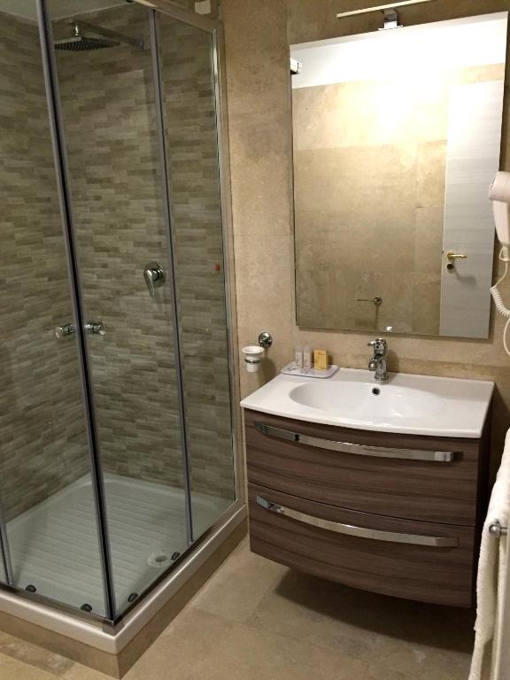 Koupelna v ubytování Hotel Riviera Palace