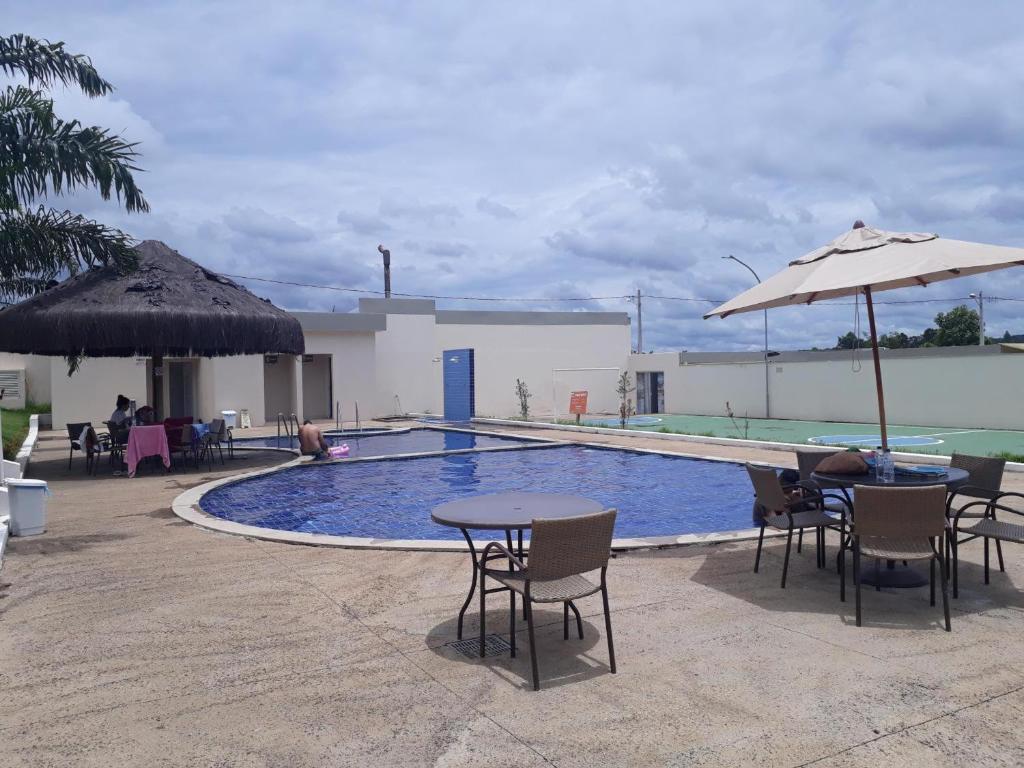 Bazén v ubytování lagoa jardins condo-resort nebo v jeho okolí