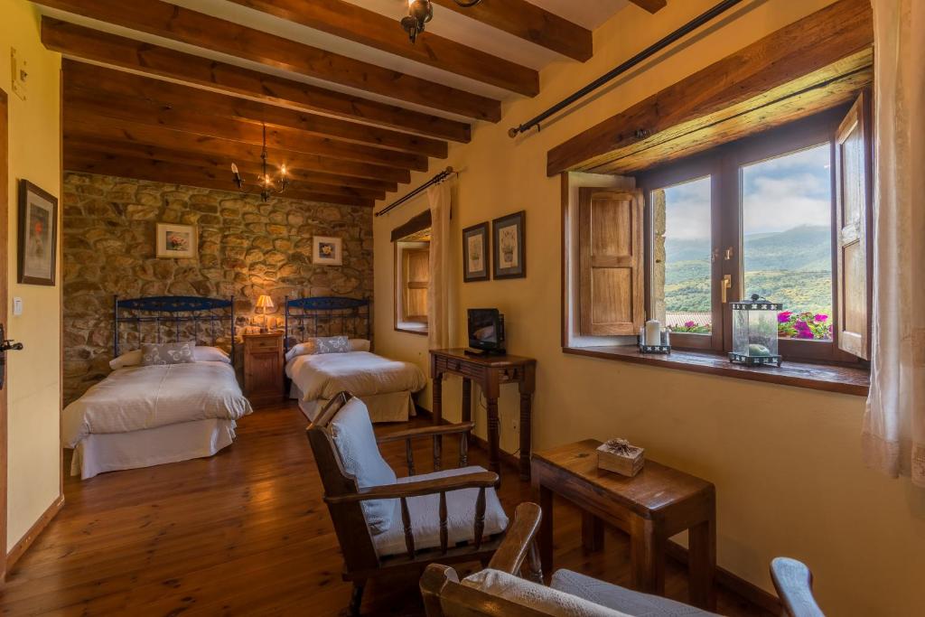Postel nebo postele na pokoji v ubytování Casavieja Rural