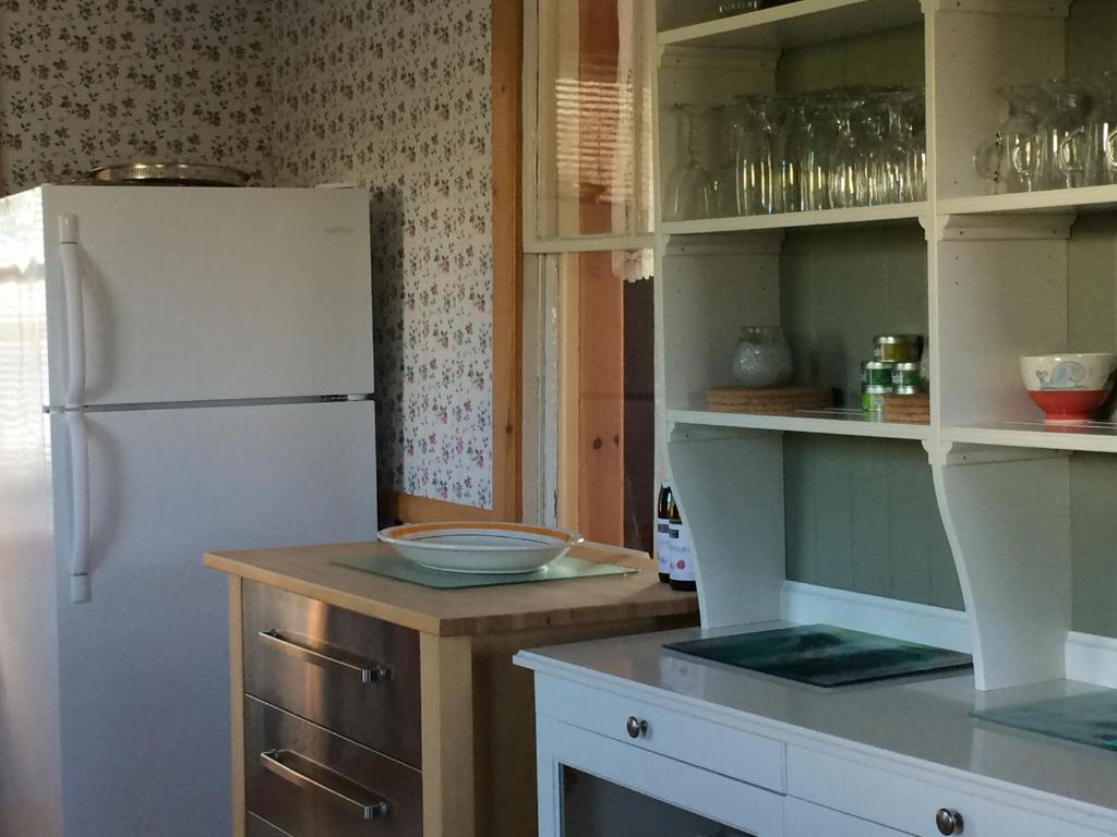 Kuchyň nebo kuchyňský kout v ubytování Maison de Percé