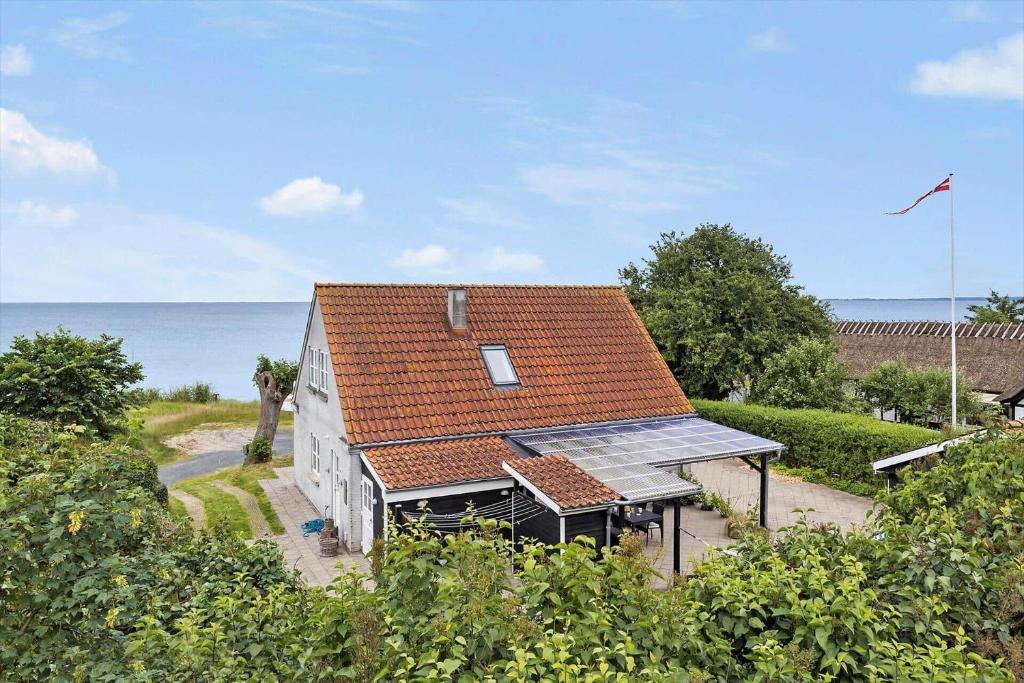 an overhead view of a house with an orange roof at FY378-Hesselager-Bellisvej-37 in Hesselager