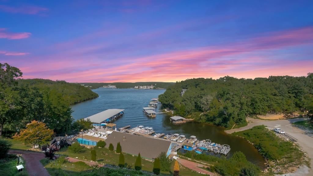 an aerial view of a marina on a river at Inn at Grand Glaize in Osage Beach