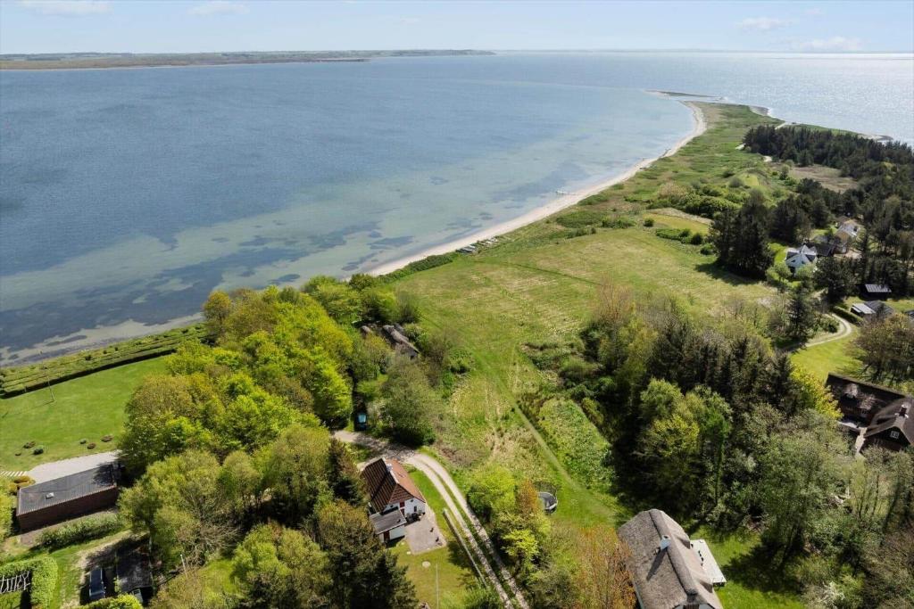 an aerial view of a beach and the ocean at LF10211-Thyholm-Ronbakken-11 in Thyholm