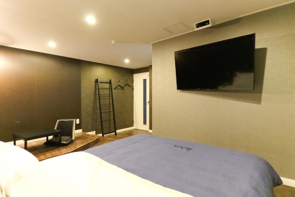 ルイス ホテルにあるテレビまたはエンターテインメントセンター