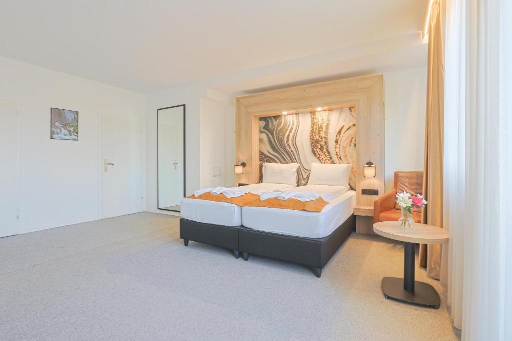 Postel nebo postele na pokoji v ubytování Liebig-Hotel