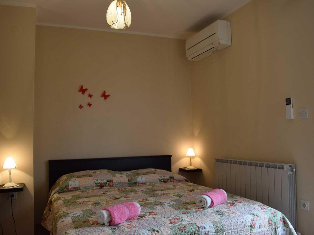 Postel nebo postele na pokoji v ubytování Guesthouse Marko