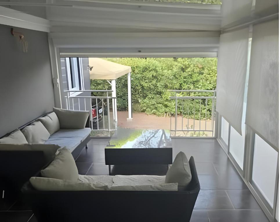 Posezení v ubytování Domaine du Pin de la Lègue