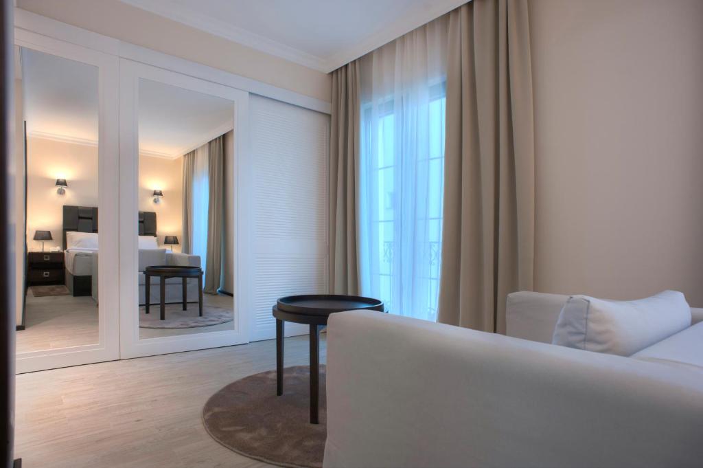 Postel nebo postele na pokoji v ubytování Hotel Moskva