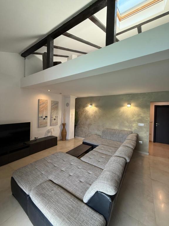 Ένα ή περισσότερα κρεβάτια σε δωμάτιο στο Apartments Miranda