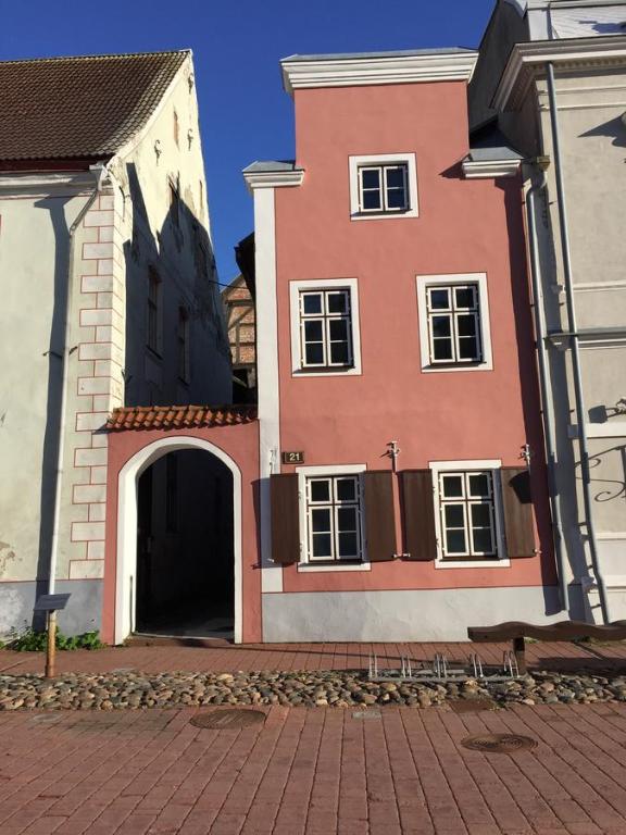 a couple of buildings sitting next to each other at Mohri Old Town Apartments in Pärnu