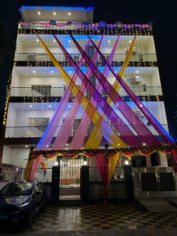 a large building with a bunch of lights on it at KDS Residency Hotel and Banquet in Greater Noida