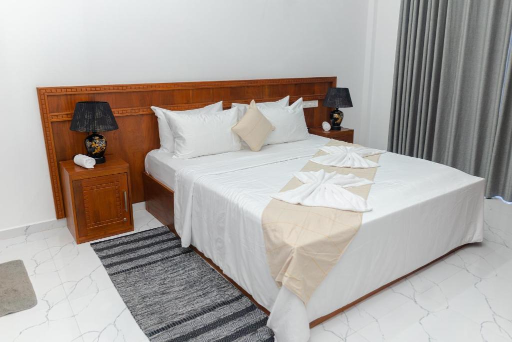 Katil atau katil-katil dalam bilik di Joalis Villa Polhena Pvt Ltd