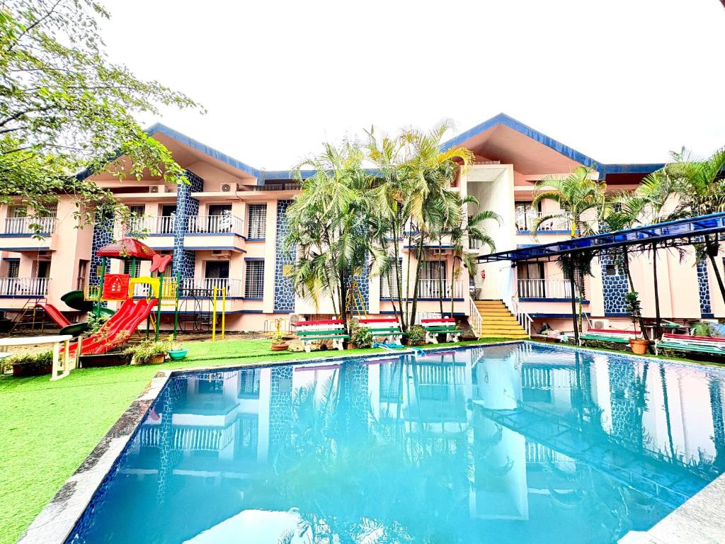 Bazén v ubytování Le Tranquil Resort nebo v jeho okolí