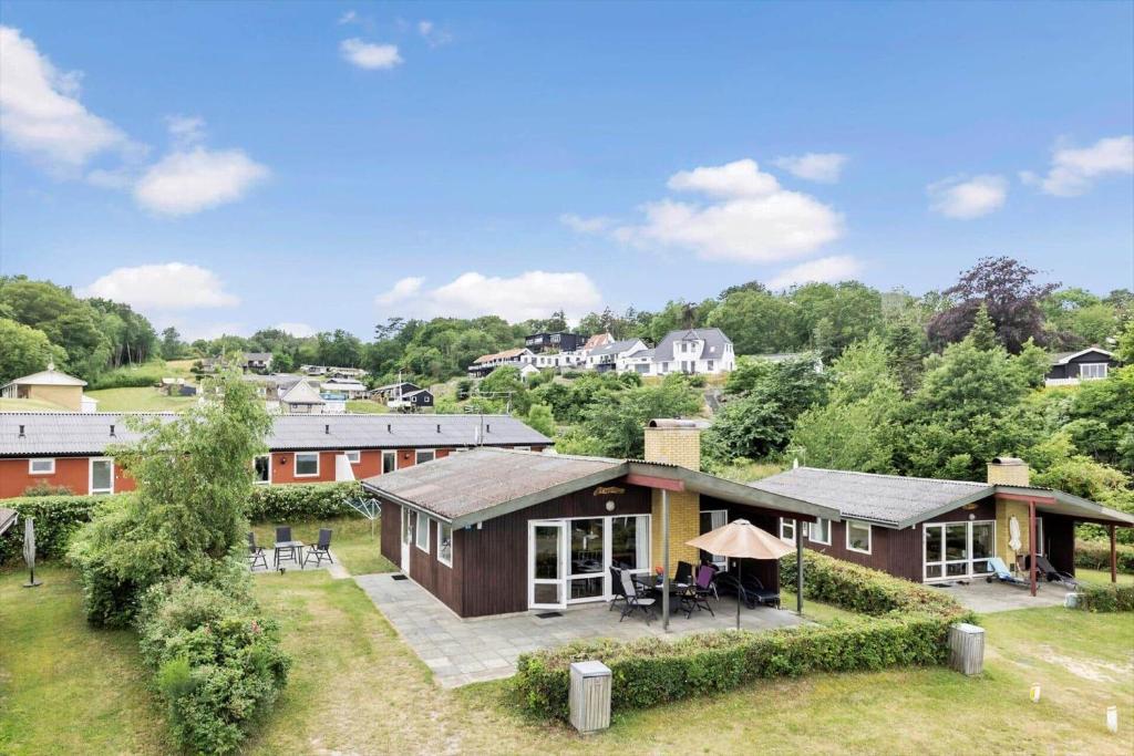 an aerial view of a house with a courtyard at 6683-Allinge-Brunekulvej-2-D in Allinge