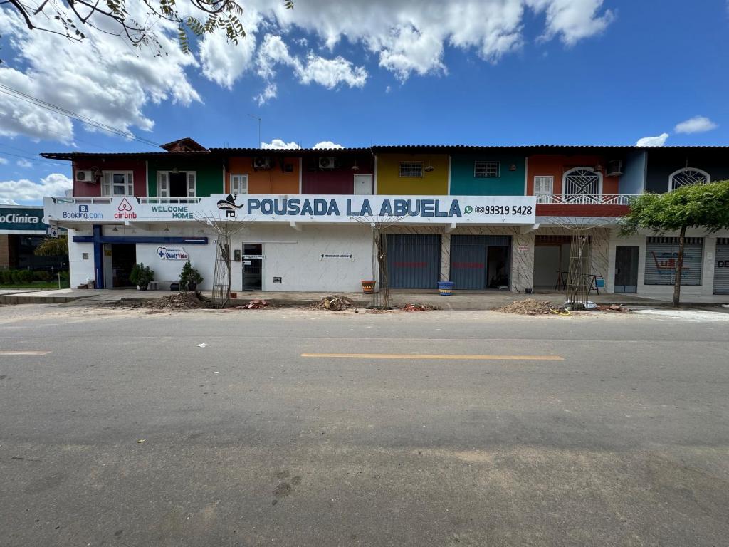a building on the side of a street at CASA DE LA ABUELA in Quixeré
