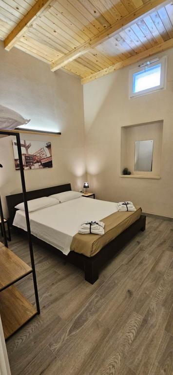 Una cama o camas en una habitación de La Casetta di via Piave