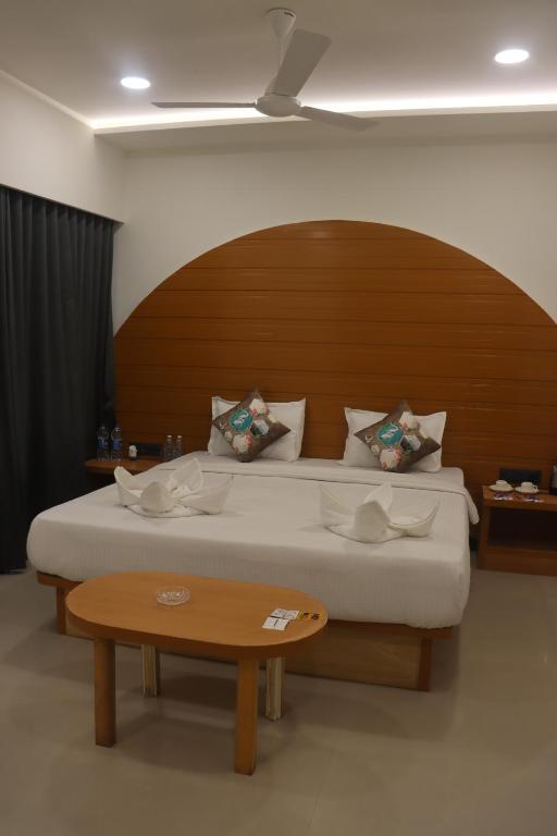 Postel nebo postele na pokoji v ubytování Hotel PineTree