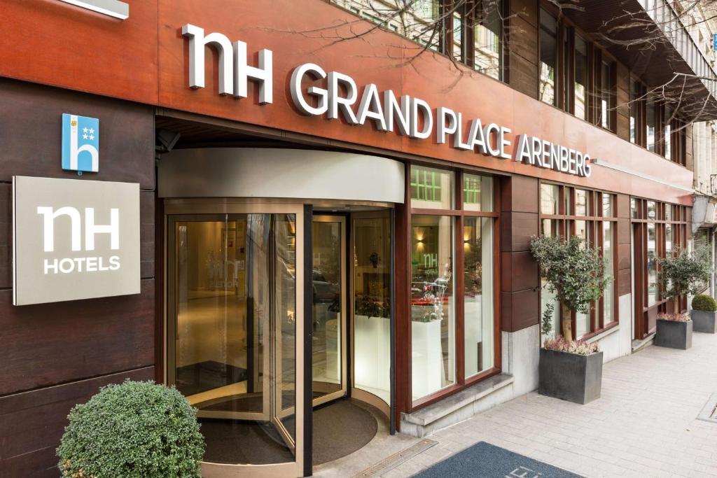 a mr grand place entrance to a building at NH Brussels Grand Place Arenberg in Brussels