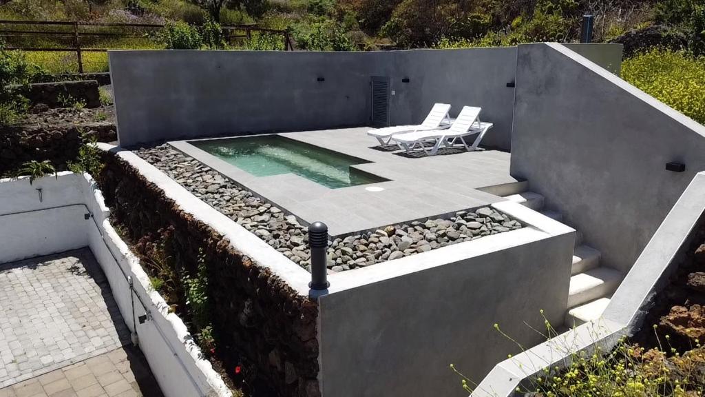 Swimmingpoolen hos eller tæt på Villa Montaña Colorada