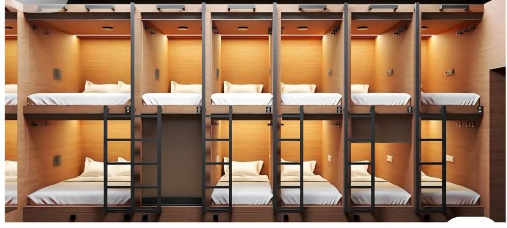 a group of bunk beds in a room at Hostel 18 Pokhara lakeside in Pokhara