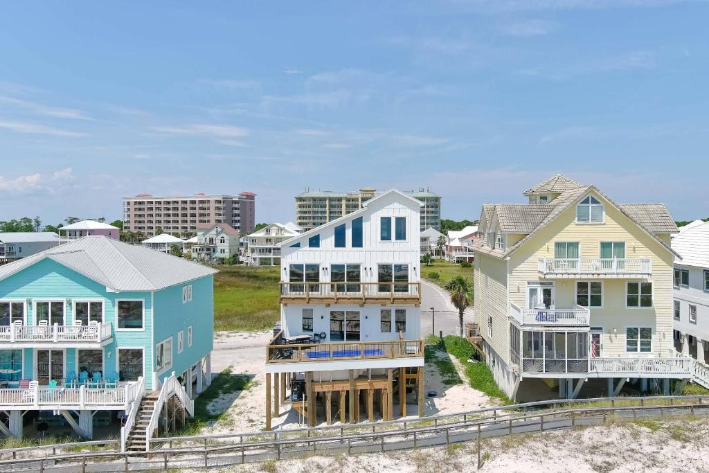 a group of houses on the beach at Sundune in Gulf Shores