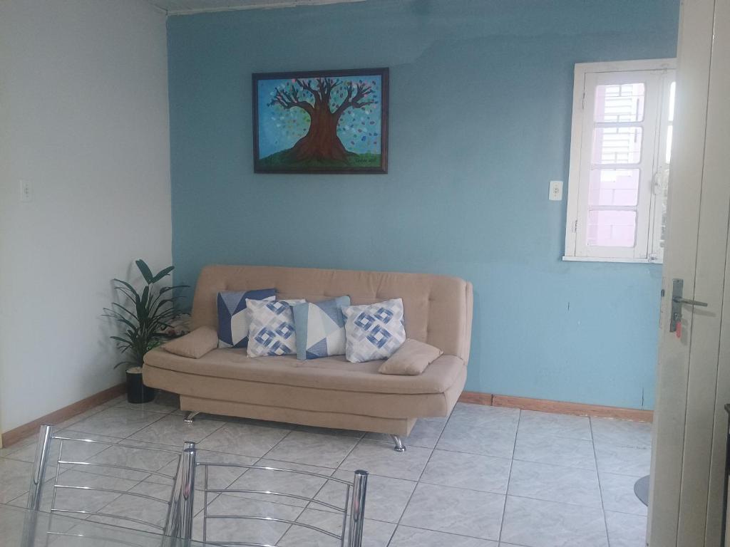 Posezení v ubytování Apto aconchegante para descansar 03