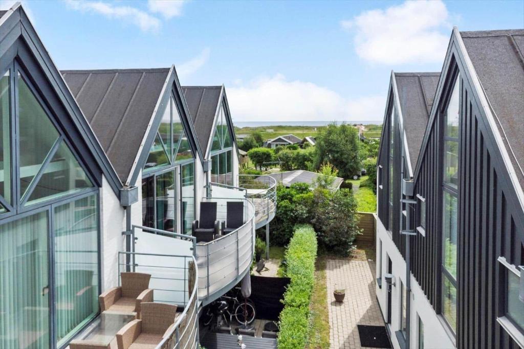 an aerial view of a house with a balcony at M318-Vaeggerlose-Marielyst-Strandvej-63-S in Marielyst