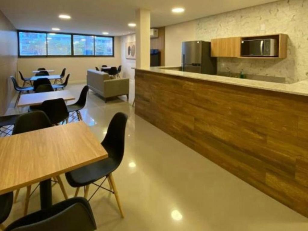 Η κουζίνα ή μικρή κουζίνα στο Apt a 500m da praia do forte