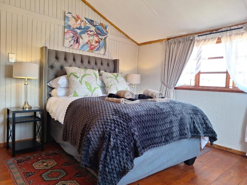 Ένα ή περισσότερα κρεβάτια σε δωμάτιο στο Nyala Bush Cabin