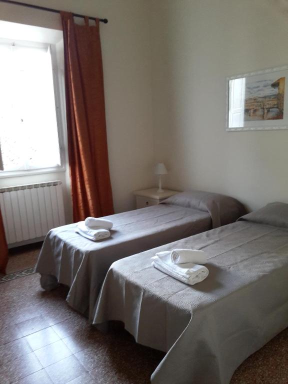 Postel nebo postele na pokoji v ubytování B&B IL TABERNACOLO