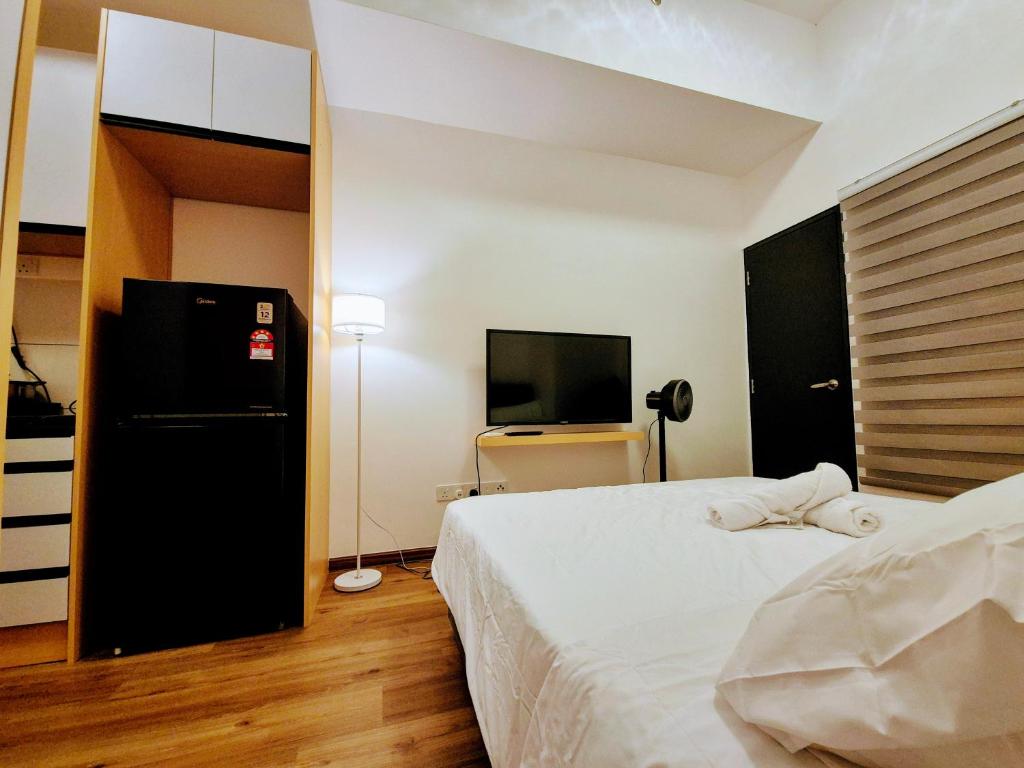 Ένα ή περισσότερα κρεβάτια σε δωμάτιο στο Cozy Living Space Edusentral