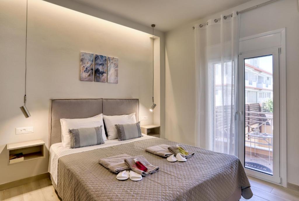 Una cama o camas en una habitación de Casa Do Ma Ni, Sitia