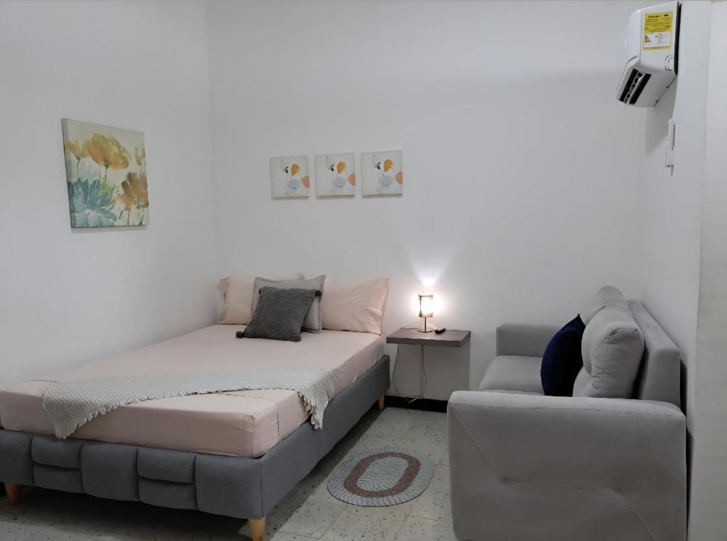 Ένα ή περισσότερα κρεβάτια σε δωμάτιο στο Casa Roosevelt